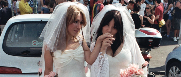 Two young Italian girls, both dressed as bride advocating for same-sex marriage at the 2010 Gay Pride in Rome